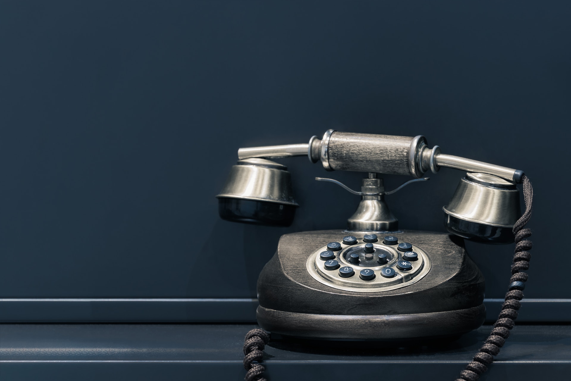 silver rotary telephone