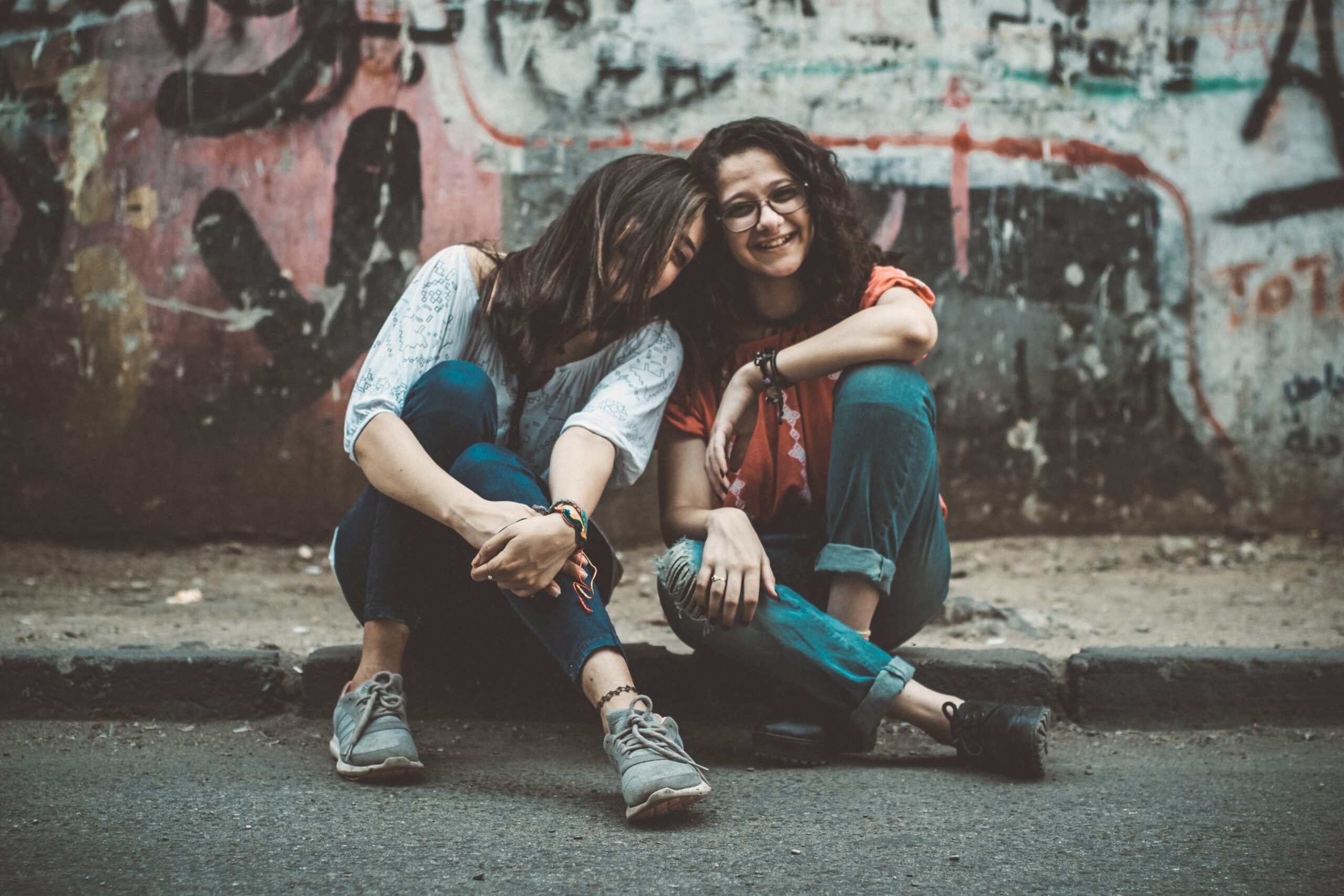Two friends sitting together