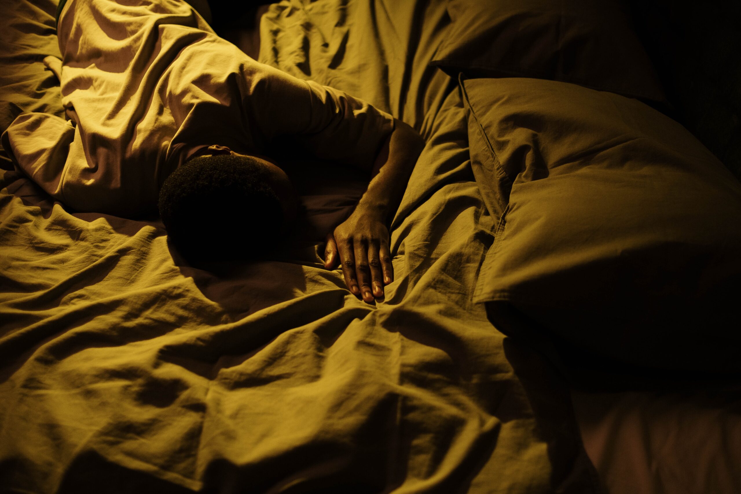 student sleep in bed at night
