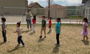 young children playing outside