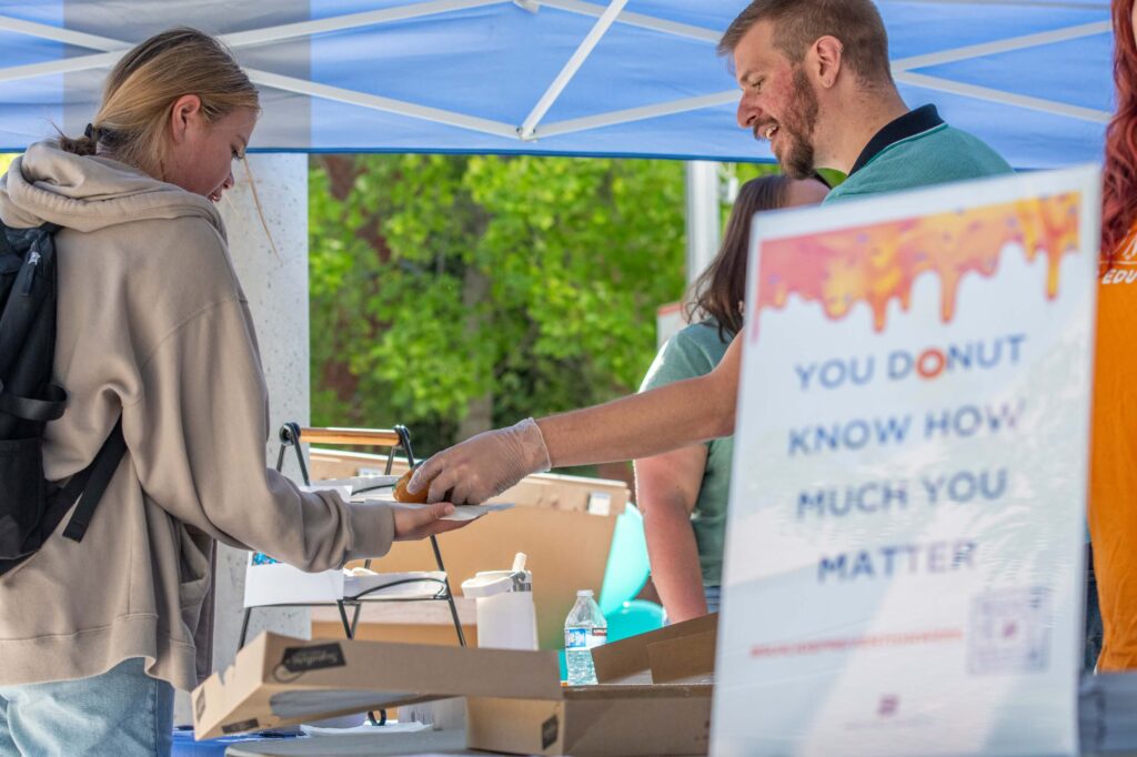 Students participate in Boise State's "You Donut Know How Much You Matter" event, as part of Suicide Prevention Week.