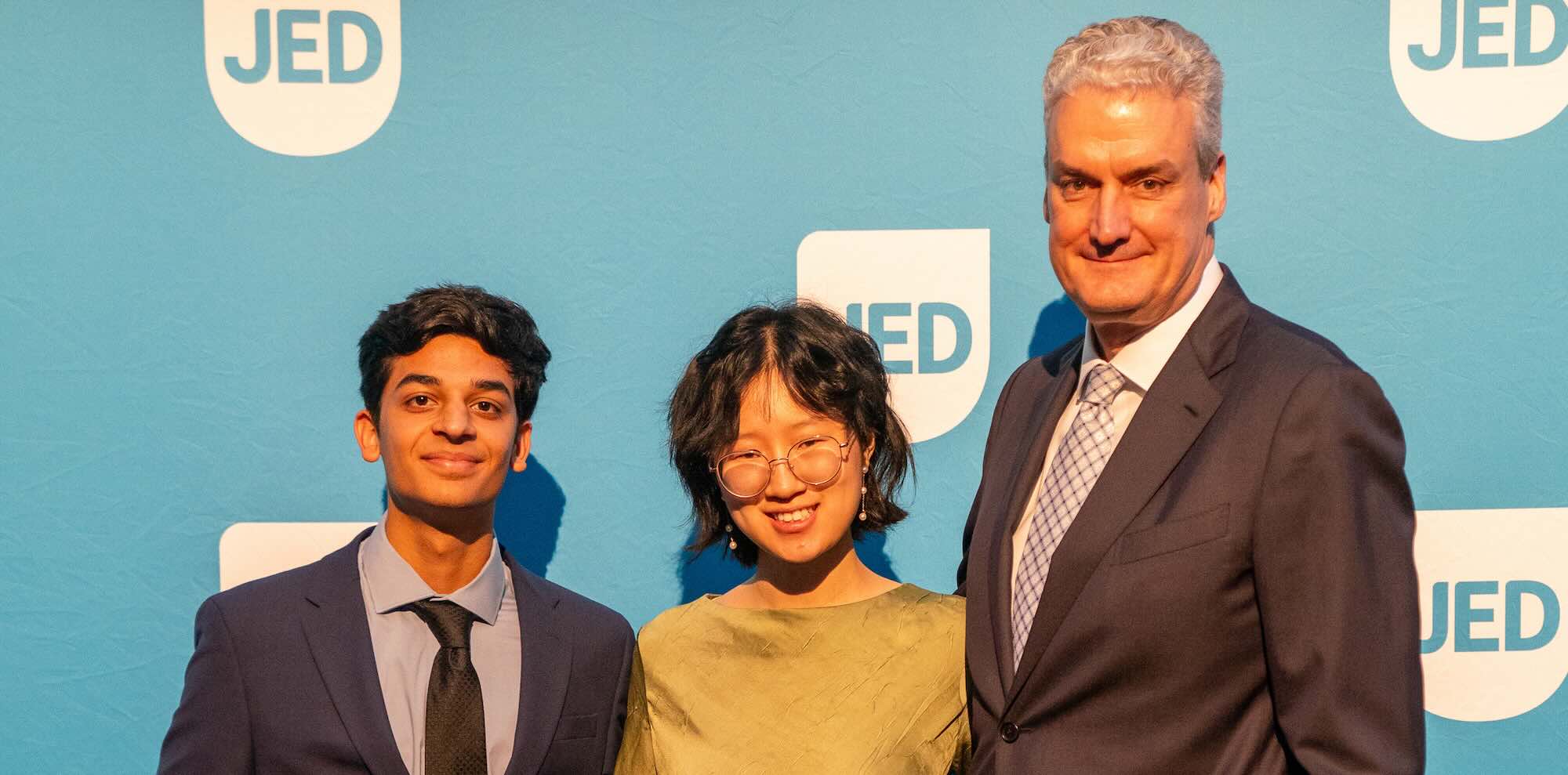 2025 Student Voice of Mental Health Award winners Rohan Satija and Nora Sun, and JED CEO John MacPhee attend the 2025 JED gala. Photo by Priyanca Rao.